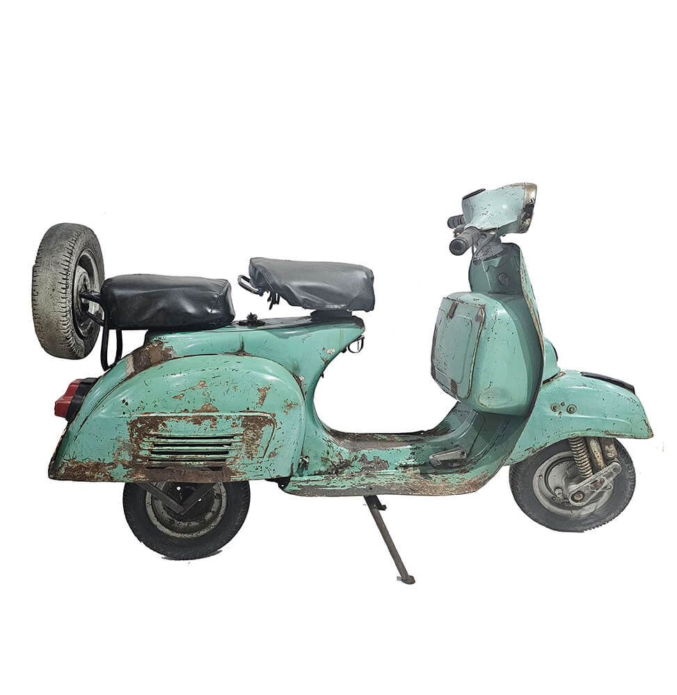 Gammel turkisblå scooter