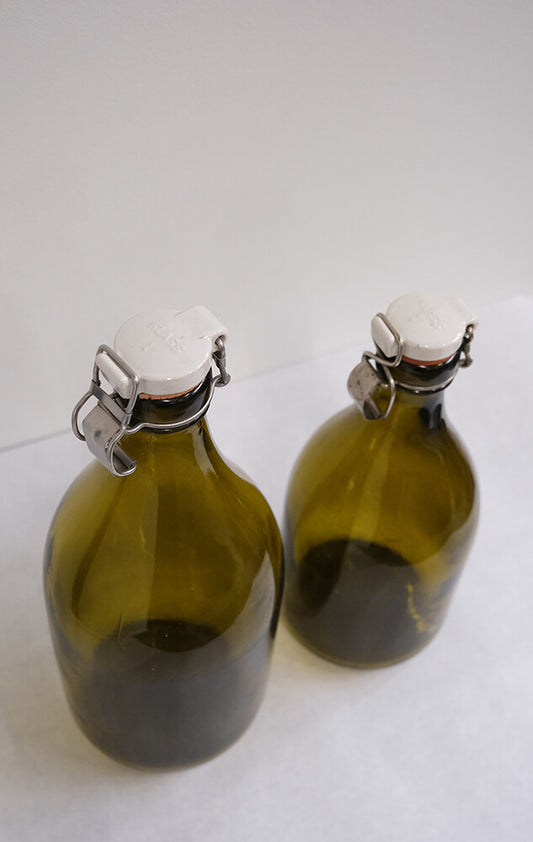 Vintage ølflaskesæt i grønt glas