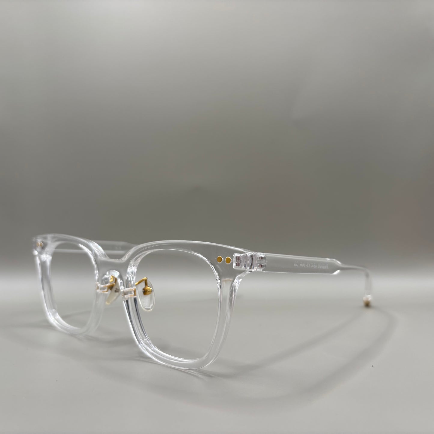 TRANSPARENT BRILLE MED GULD PÅ