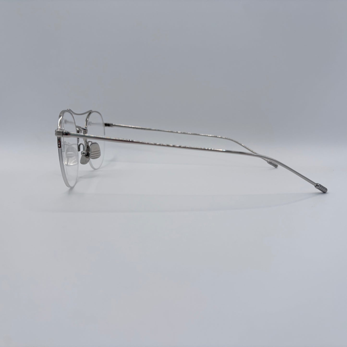 MINIMALISTISK RANDLØS RUND BRILLE
