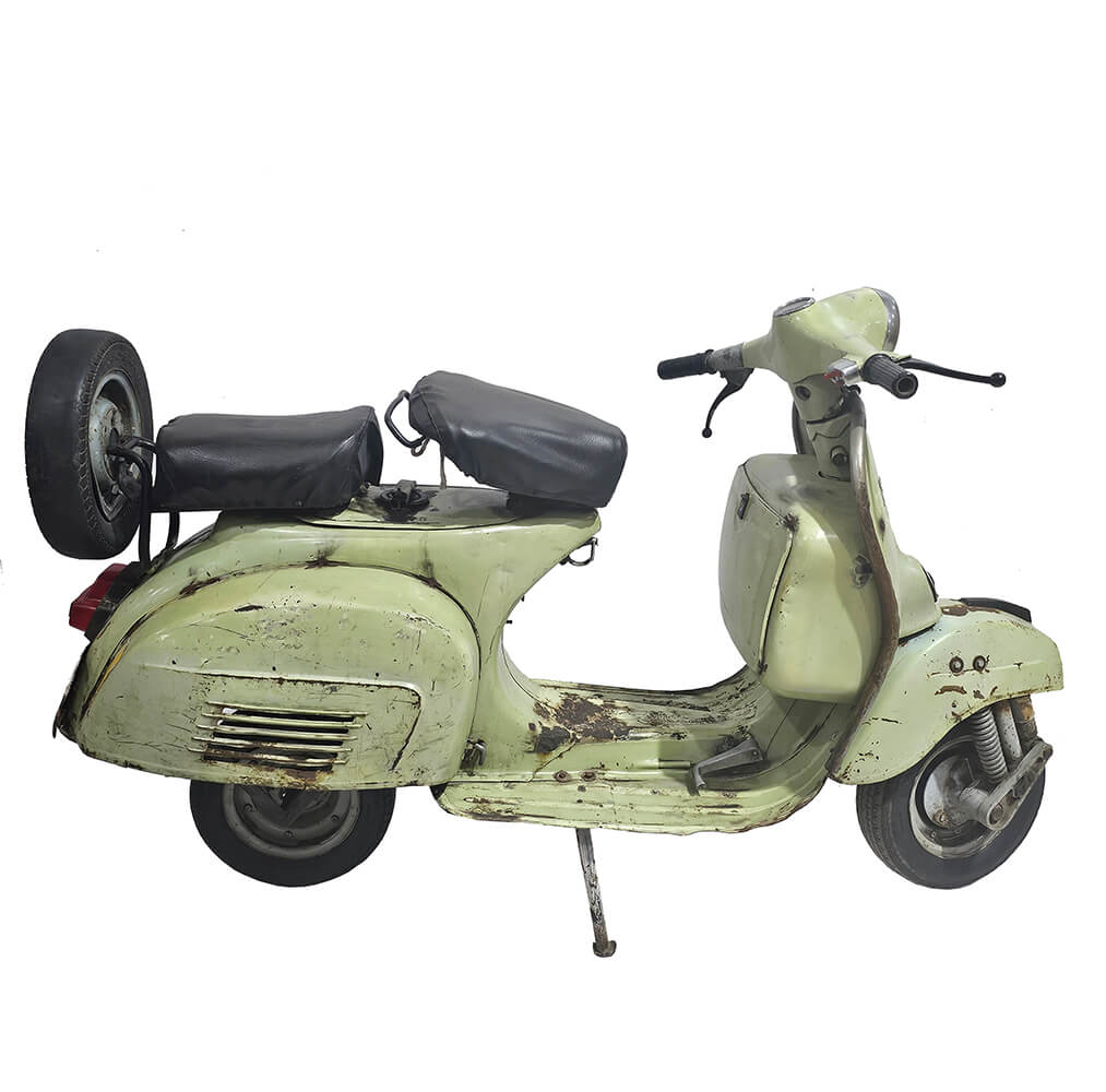 Gammel grøn scooter