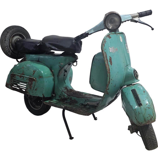 Gammel turkisblå scooter