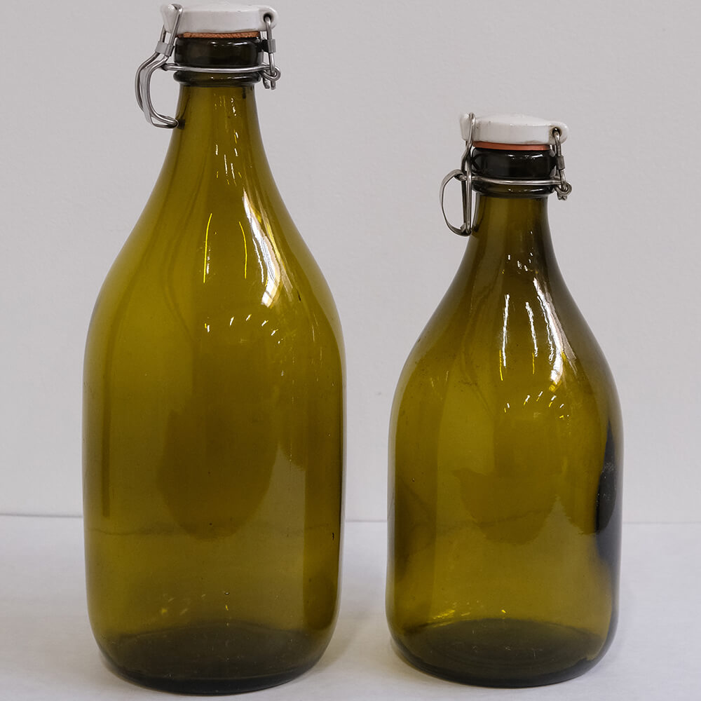 Vintage ølflaskesæt i grønt glas