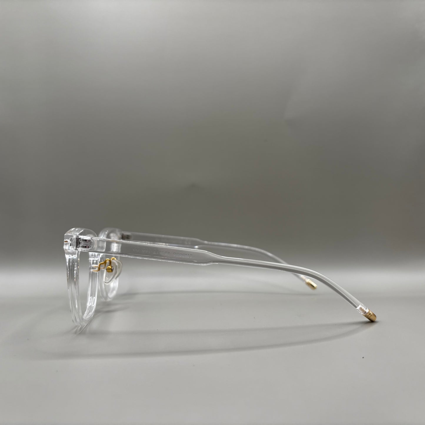 TRANSPARENT BRILLE MED GULD PÅ